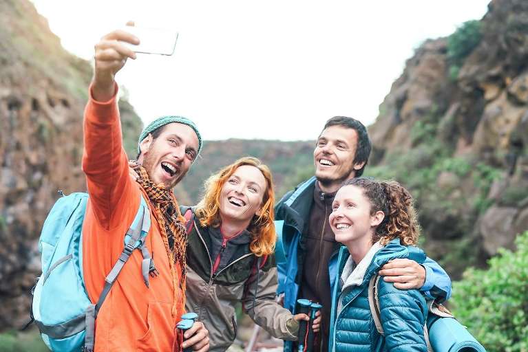 Group of people taking a selfie together, st. paul mn