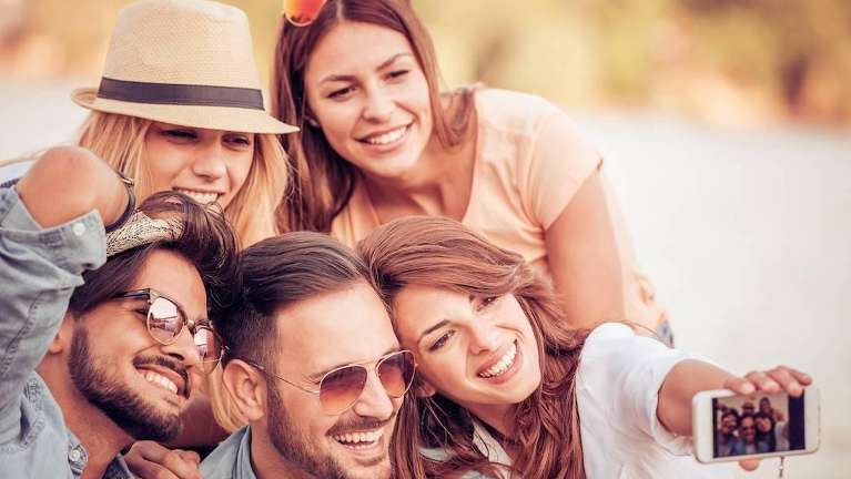 group of friends taking a selfie