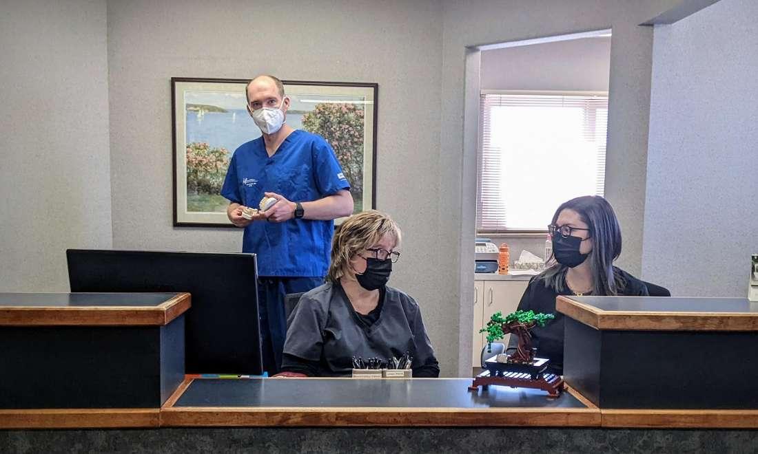 Dr. Grittner and staff by the front desk